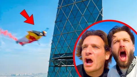 Extreme Athletes Fly Through Skyscraper in Wing Suit Stunt