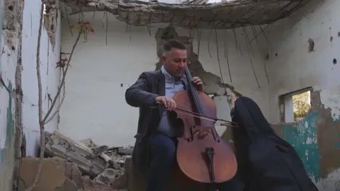 Syrian Cellist Performs in Damascus Ruins to Express War's Pain and Hope